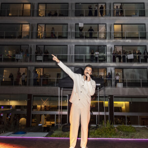 Exclusif - Amir Haddad (concert au pied de l'hotel Pullman Tour Eiffel pour les résidents, qui avaient un casque pour écouter) - Le Grand Dîner sur le rooftop de l'hôtel Pullman Tour Eiffel à Paris, © Jack Tribeca/Bestimage 