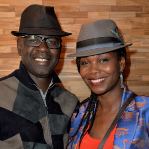 Exclusif - Lilian Thuram et sa compagne Kareen Guiock - Ouverturre d'un Tacoshake sur les champs Elysées à Paris, France. © Veeren/Bestimage