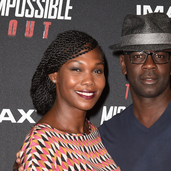 Lilian Thuram et sa compagne Kareen Guiock au photocall lors de l'avant-première mondiale de "Mission: Impossible Fallout" au Palais de Chaillot à Paris, le 12 juillet 2018. © Giancarlo Gorassini/Bestimage