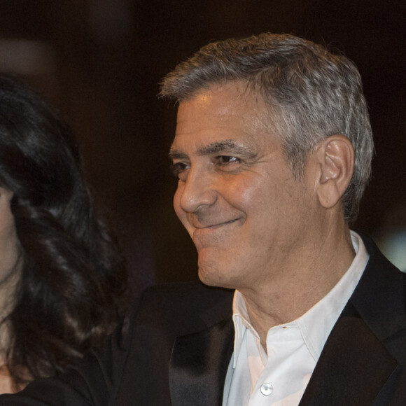 George Clooney et sa femme Amal Alamuddin - Arrivées au dîner de la 42ème cérémonie des César au Fouquet's à Paris. Le 24 février 2017 © Pierre Perusseau / Bestimage