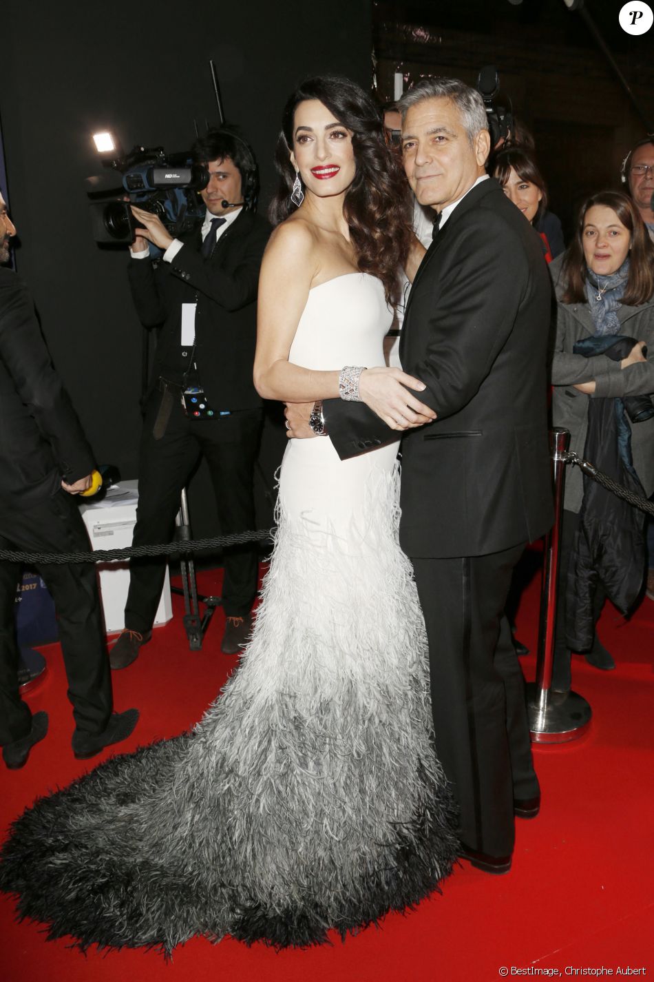 Amal Alamuddin et son mari - Photocall de la 42ème cérémonie des Cesar à la salle Pleyel à Paris, le 24 février 2017. © Christophe Aubert via Bestimage