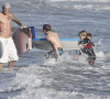 David Beckham et ses fils Brooklyn, Romeo et Cruz à Malibu, en août 2011.