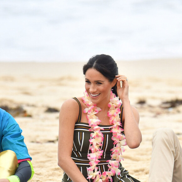 Le prince Harry, duc de Sussex, et Meghan Markle, duchesse de Sussex, enceinte, visitent la plage de Bondi Beach. Sydney, le 19 octobre 2018.