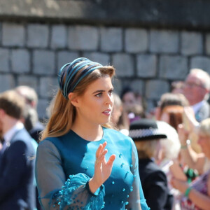 La princesse Eugenie d’York, Le prince Andrew, duc d’York et La princesse Beatrice d’York - Les invités arrivent à la chapelle St. George pour le mariage du prince Harry et de Meghan Markle au château de Windsor, Royaume Uni, le 19 mai 2018.  (left to right) Princess Eugenie, The Duke of York and Princess Beatrice arrive at St George's Chapel at Windsor Castle for the wedding of Meghan Markle and Prince Harry. 