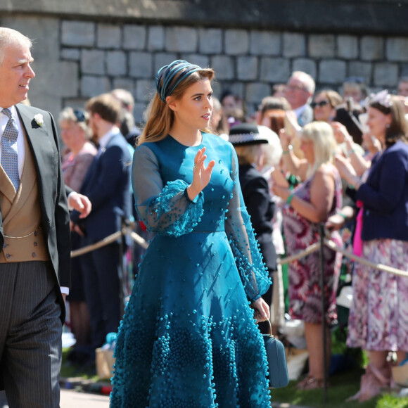 La princesse Eugenie d’York, Le prince Andrew, duc d’York et La princesse Beatrice d’York - Les invités arrivent à la chapelle St. George pour le mariage du prince Harry et de Meghan Markle au château de Windsor, Royaume Uni, le 19 mai 2018.  (left to right) Princess Eugenie, The Duke of York and Princess Beatrice arrive at St George's Chapel at Windsor Castle for the wedding of Meghan Markle and Prince Harry. 