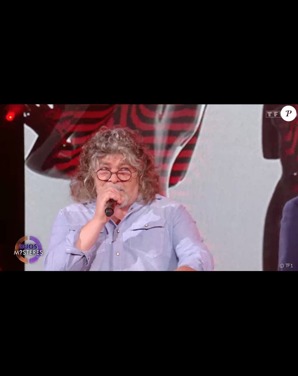 Marc Lavoine et son frère Francis dans l'émission "Duos Mystères" sur TF1 le 20 août 2021.