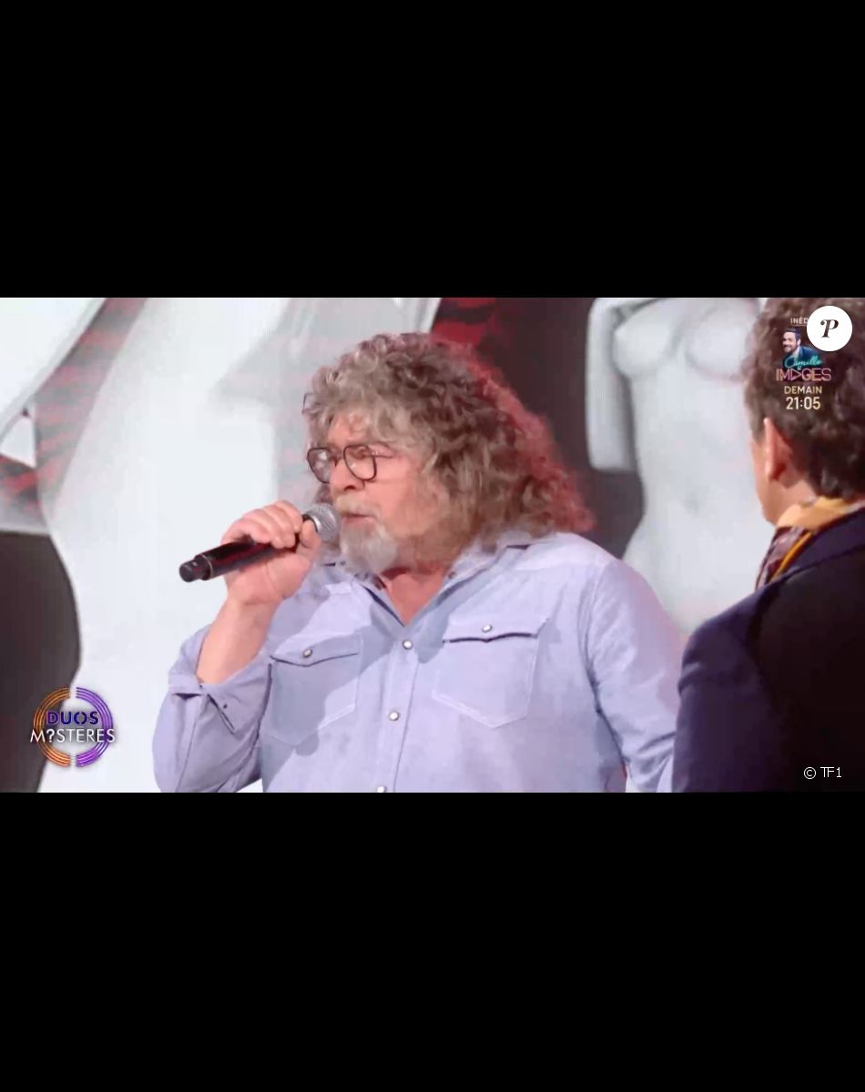 Marc Lavoine et son frère Francis dans l'émission "Duos Mystères" sur TF1 le 20 août 2021.