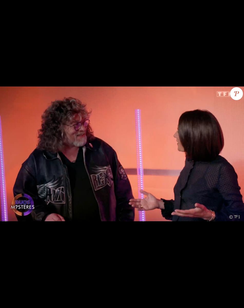 Marc Lavoine et son frère Francis dans l'émission "Duos Mystères" sur TF1 le 20 août 2021.