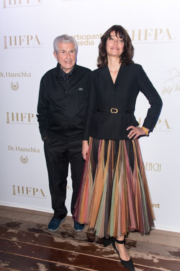 Claude Lelouch et Marianne Denicourt à la soirée "HFPA & Participant Media Honour Help Refugees" lors du 72ème Festival International du Film de Cannes, France, le 19 mai 2019.