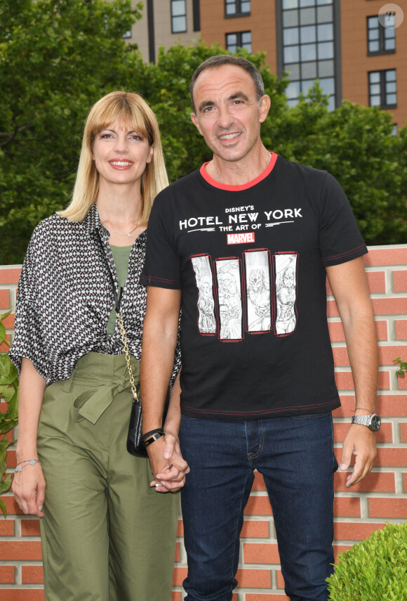 Nikos Aliagas avec sa femme Tina Grigoriou - Photocall à l'occasion de l'inauguration du nouveau Disney's Hotel New York - The Art of Marvel à Disneyland Paris le 26 juin 2021. © Guirec Coadic / Bestimage