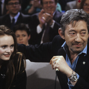 Archives -  Vanessa Paradis et Serge Gainsbourg lors de l'émission "Sacrée Soirée", le 16 mars 1990 à Paris. © Bernard Leguay via Bestimage