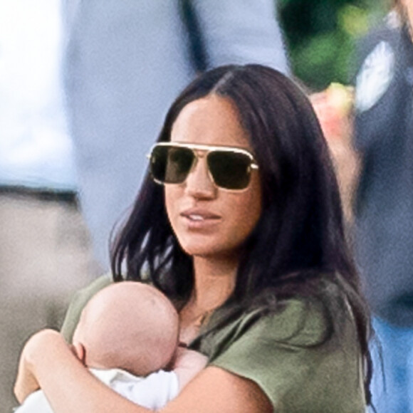 Meghan Markle, duchesse de Sussex, son fils Archie Harrison Mountbatten-Windsor et Catherine (Kate) Middleton, duchesse de Cambridge lors d'un match de polo de bienfaisance King Power Royal Charity Polo Day à Wokinghan, comté de Berkshire, Royaume Uni, le 10 juillet 2019.