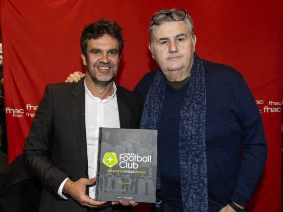 Exclusif - Hervé Mathoux et Pierre Ménès - Séance de dédicace du livre Canal Football Club à la Fnac des Champs Elysée à Paris le 15 novembre 2018. © Pierre Perusseau/Bestimage