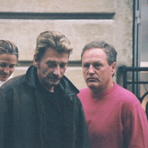 Exclusif - Johnny Hallyday avec André Boudou, le père de Laeticia et sa compagne à Paris. Le 13 décembre 2005