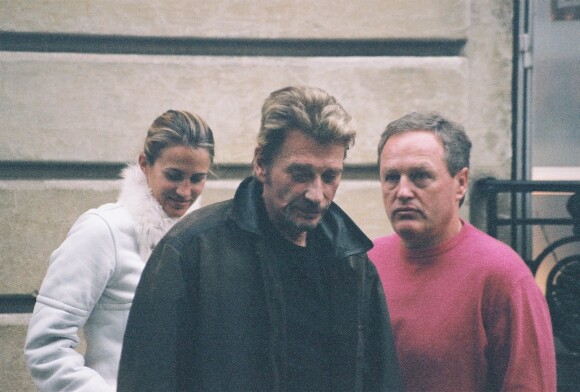 Exclusif - Johnny Hallyday avec André Boudou, le père de Laeticia et sa compagne à Paris. Le 13 décembre 2005