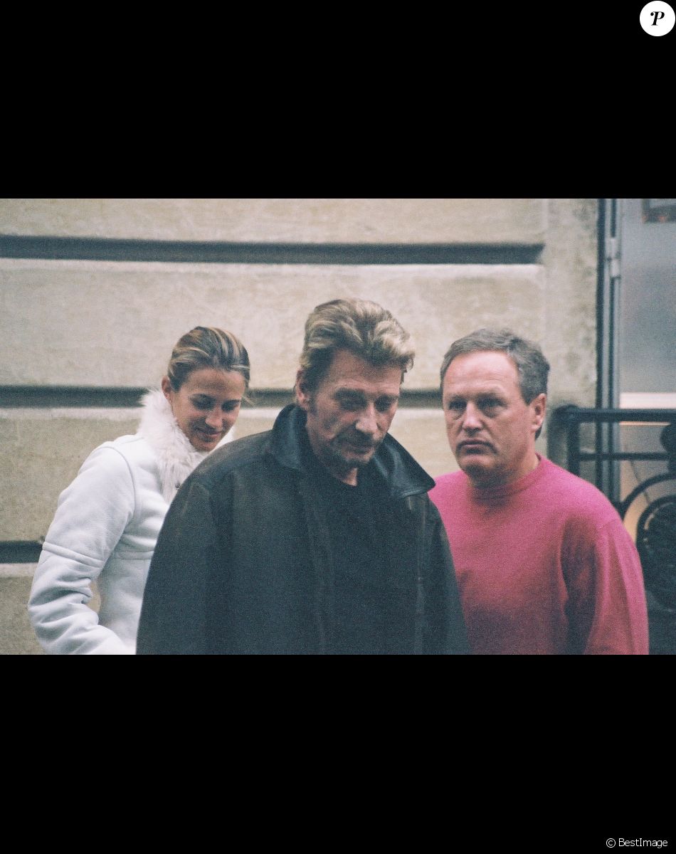 Exclusif - Johnny Hallyday avec André Boudou, le père de Laeticia et sa compagne à Paris. Le 13 décembre 2005