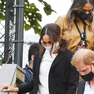 Le prince Harry, duc de Sussex et Meghan Markle quittent le "Global Citizen Live Festival" à Central Park à New York, le 25 septembre 2021.