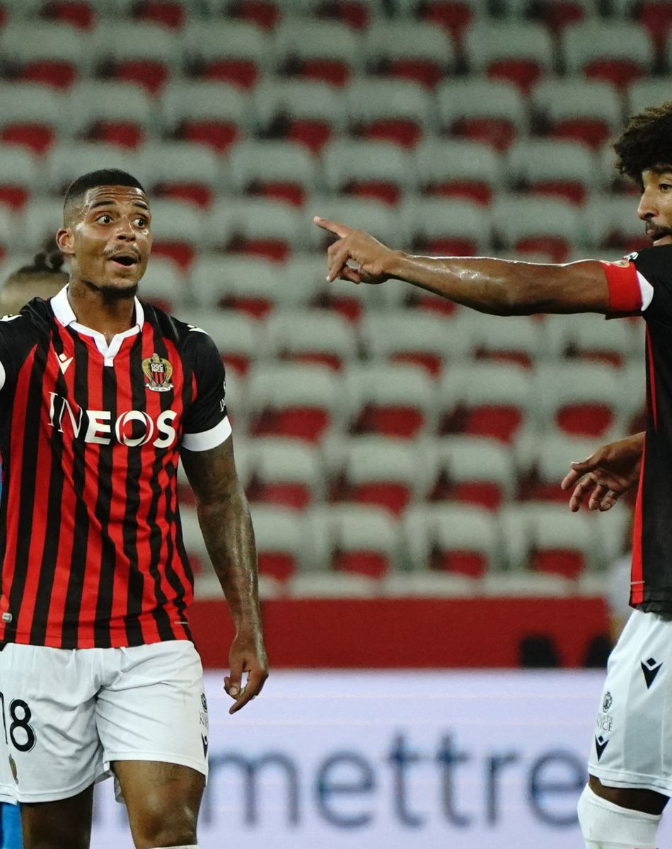 Mario Lemina (OGC Nice) - Dante (OGC Nice) - Match de football en ligue 1 Uber Eats : Match définitivement arrêté après le refus des joueurs de l'OM (Marseille) de reprendre le jeu suites à des incidents avec les supporters de Nice le 22 août 2021. © Norbert Scanella / Panoramic / Bestimage