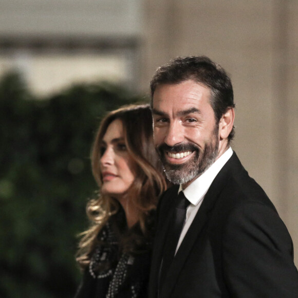 L'ancien joueur de football français Robert Pires et sa femme Jessica - Dîner au Palais de l'Elysée en l'honneur des 50 ans du Variétés Club de France, à Paris, le 14 octobre 2021. © Stéphane Lemouton / Bestimage