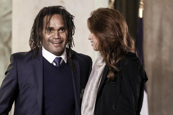 L'ancien footballeur français Christian Karembeu et sa femme Jacky Chamoun - Dîner au Palais de l'Elysée en l'honneur des 50 ans du Variétés Club de France, à Paris, le 14 octobre 2021. © Stéphane Lemouton / Bestimage