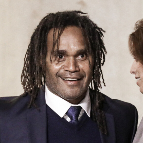 L'ancien footballeur français Christian Karembeu et sa femme Jacky Chamoun - Dîner au Palais de l'Elysée en l'honneur des 50 ans du Variétés Club de France, à Paris, le 14 octobre 2021. © Stéphane Lemouton / Bestimage