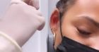 Christina Milian à Paris avec M. Pokora : elle s'ouvre une folie piercing, et montre tout