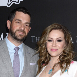 Alyssa Milano et son mari Dave Bugliari au photocall du 10ème anniversaire du gala caritatif "Core" à Los Angeles, le 15 janvier 2020. 