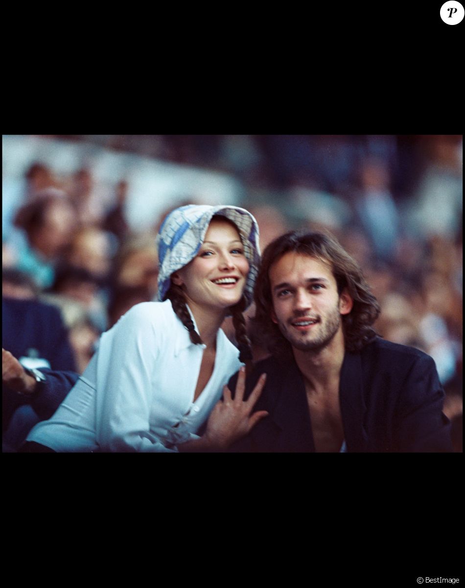ARCHIVES - CARLA BRUNI ET VINCENT PEREZ ASSISTENT AU CONCERT DE JOHNNY HALLYDAY POUR SES 50 ANS AU PARC DES PRINCES