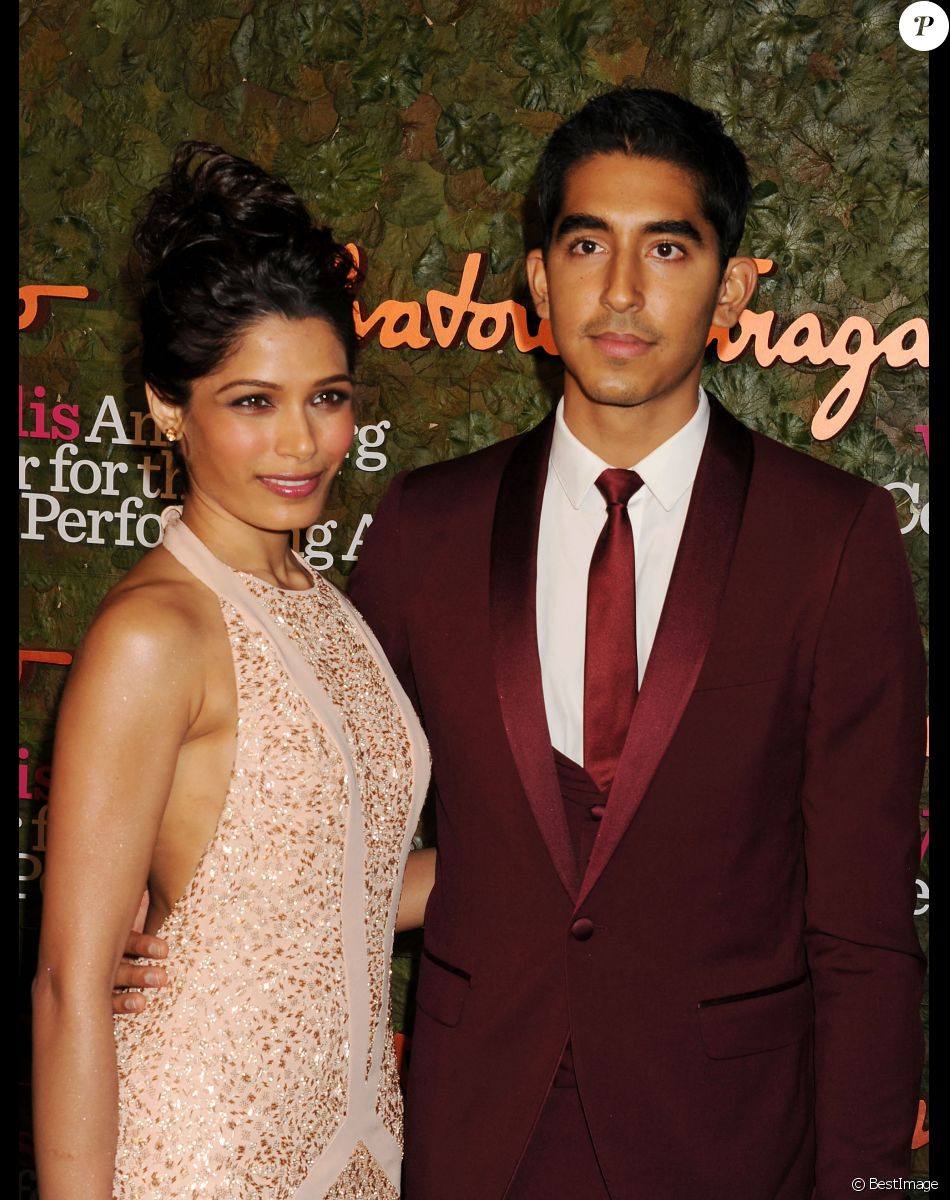 Freida Pinto, Dev Patel - Tapis rouge de la soiree Salvatore Ferragamo a Los Angeles, le 17 octobre 2013.