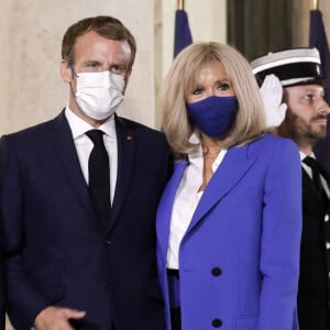 Le président de la République, Emmanuel Macron et la première dame, Brigitte Macron recoivent Kyriakos Mitsotakis, Premier ministre de la République Hellénique et son épouse Mareva Grabowski pour un diner de travail, au palais de l'Elysée, Paris, le 27 septembre 2021. © Stéphane Lemouton / Bestimage 