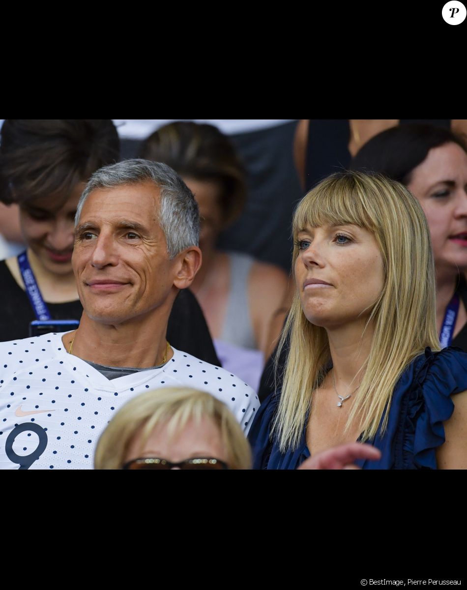Nagui Fam et Mélanie Page dans les tribunes lors du quart de finale de la Coupe du Monde Féminine de football opposant les Etats-Unis à la France au Parc des Princes à Paris, France, le 28 juin 2019. © Pierre Perusseau/Bestimage