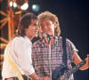 Jean-Jacques Goldman et Michael Jones en concert en 1987.
