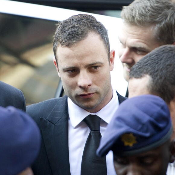 Oscar Pistorius arrive au tribunal de Pretoria pour entendre le verdict final, suite au meurtre de sa compagne Reeva Steenkamp. Le 12 septembre 2014.