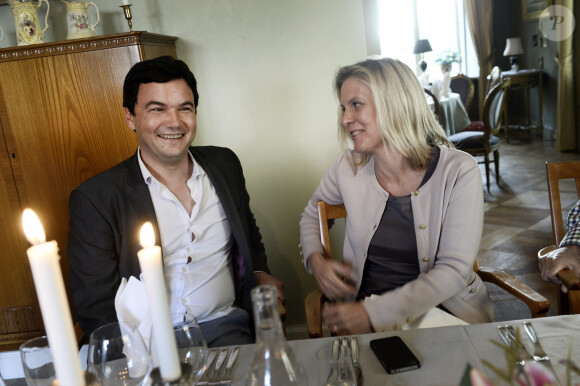 L'économiste français Thomas Piketti et la ministre des finances suédoise Magdalena Andersson lors du Almedalen 2014 à Visby, le 30 juin 2014.