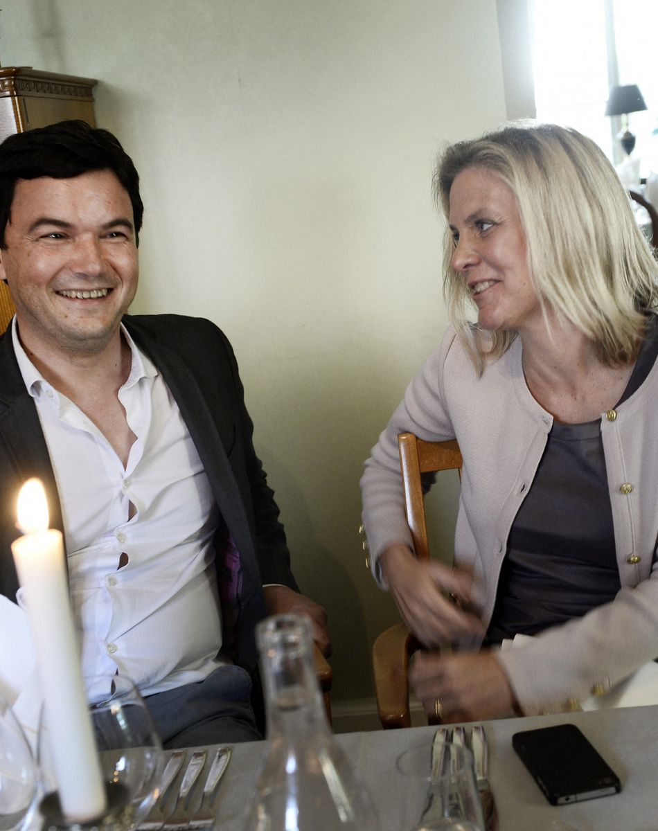 L'économiste français Thomas Piketti et la ministre des finances suédoise Magdalena Andersson lors du Almedalen 2014 à Visby, le 30 juin 2014.