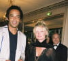 Yannick Noah et sa compagne Isabelle Camus (enceinte) à Roland Garros en 2004. 
