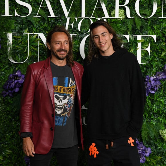 Bob Sinclar et son fils Raphaël Le Friant - Soirée caritative "LuisaViaRoma" pour l'UNICEF à Saint-Barthélemy dans les Caraïbes le 29 décembre 2021.