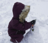 La fille de Diane Kruger et Norman Reedus construit un bonhomme de neige. Février 2021.