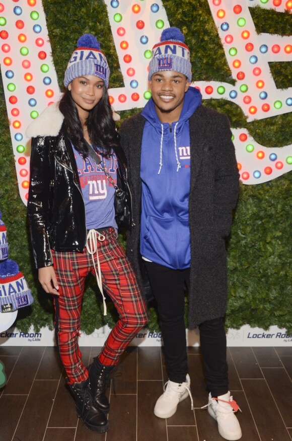 Chanel Iman et son fiancé Sterling Shepard assistent au lancement de la nouvelle collection 'New Era' dans le magasin Macy's Herald Square à New York, le 12 décembre 2017.