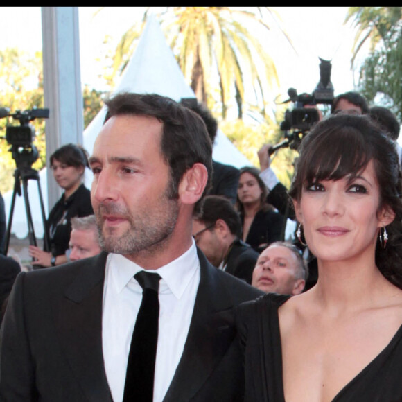 Mélanie Doutey et Gilles Lellouche - Montée des marches du film "The Artist" - 64e Festival de Cannes. 2011.