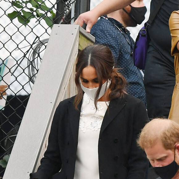 Le prince Harry, duc de Sussex et Meghan Markle quittent le "Global Citizen Live Festival" à Central Park à New York, le 25 septembre 2021.  09/25/2021 Meghan Markle and Prince Harry at the Global Citizen Live in Central Park New York. The couple gave a joint and coordinated speech to the crowd emphasizing the need to end the pandemic. 