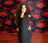 Amel Bent (enceinte) lors de la 23e édition des NRJ Music Awards au Palais des Festivals de Cannes