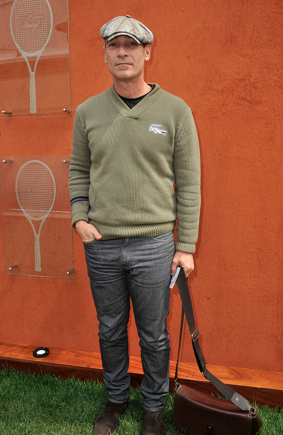 Jean-Marc Barr aux Internationaux de France de tennis a Roland-Garros, le 3 juin 2013.
