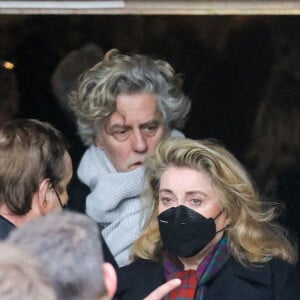 Laurent Boutonnat, Catherine Deneuve - Sorties des obsèques (bénédiction) de Gaspard Ulliel en l'église Saint-Eustache à Paris. Le 27 janvier 2022 © Jacovides-Moreau / Bestimage 