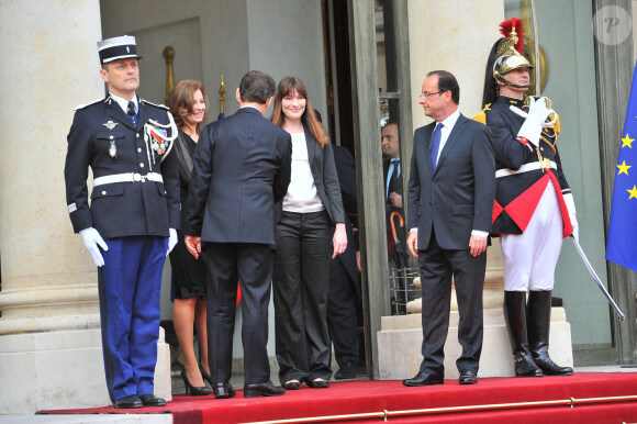 Valérie Trierweiler, Nicolas Sarkozy, Carla Bruni et François Hollande lors de l'investiture de François Hollande en tant que président de la République à l'Elysée en 2012  /Bestimage