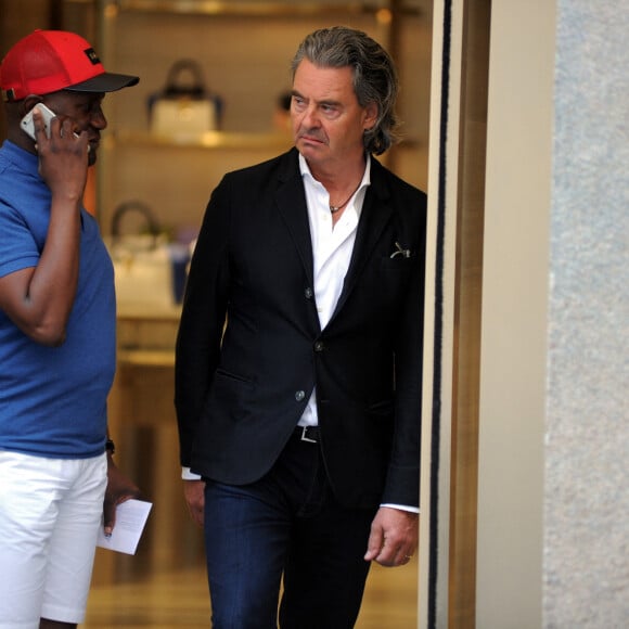 Tina Turner et son mari Erwin Bach sortent d'une boutique Armani à Milan, le 6 juin 2016. 