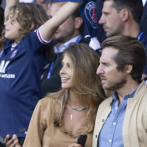 Ophélie Meunier (enceinte) et son mari Mathieu Vergne - People en tribune lors de la rencontre de football Paris Saint Germain PSG contre Clermont (4-0) au Parc des Princes à Paris le 11 septembre 2021 