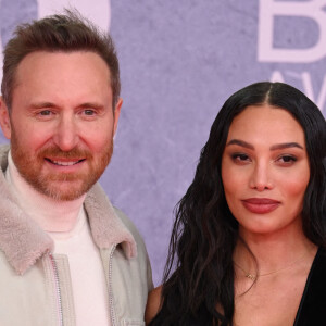 David Guetta et sa compagne Jessica Ledon assistent aux BRIT Awards 2022 à l'O2. Londres, le 8 février 2022.