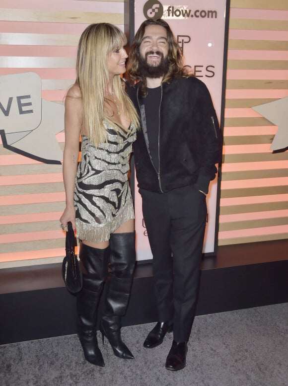 Heidi Klum et son mari Tom Kaulitz au photocall "Homecoming Weekend" au Pacific Center à Los Angeles, le 11 février 2022.