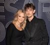 Virginie Efira et Niels Schneider sur le tapis rouge de la 47e cérémonie des César, à l'Olympia à Paris.